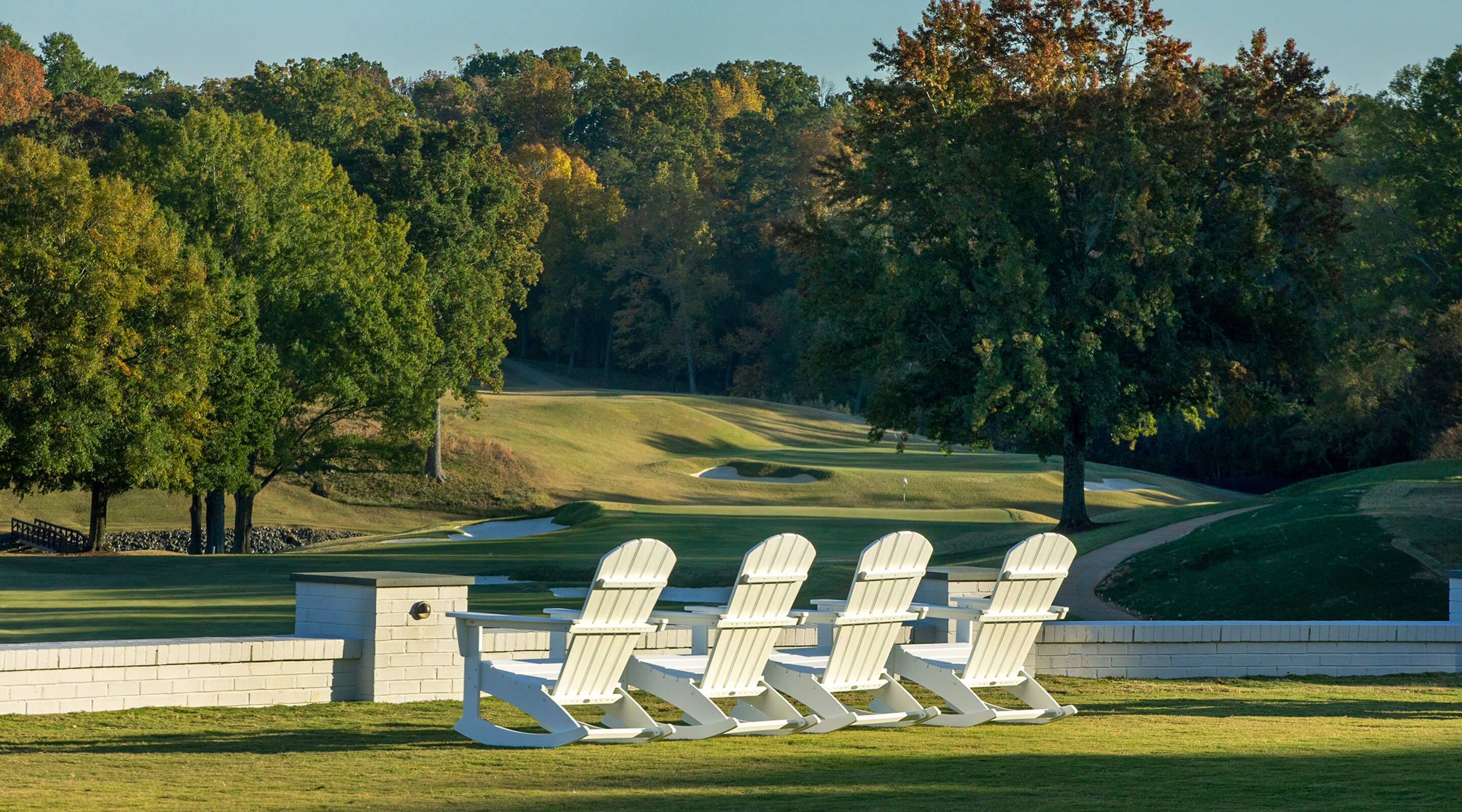 chairs by the golf course
